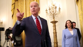 President Joe Biden and Vice President Kamala Harris address a group of reporters at the White House.