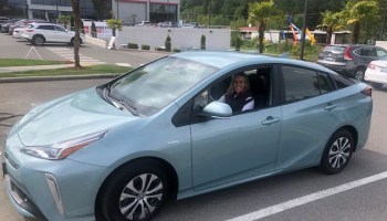 Amy Harder in her new car: a prius. "I like to joke that it's like going into the grocery store, saying you're going to find the most exciting ice cream flavor ever, and you come out with vanilla," said Harder.
