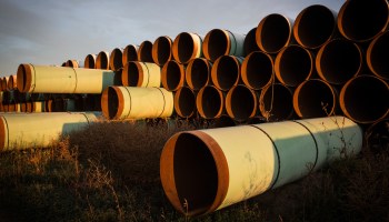 Miles of unused pipe, prepared for the proposed Keystone XL pipeline, sit in a North Dakota lot in 2014.
