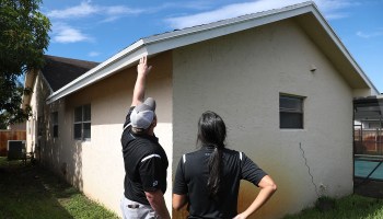Zillow renovation estimators examine a home.