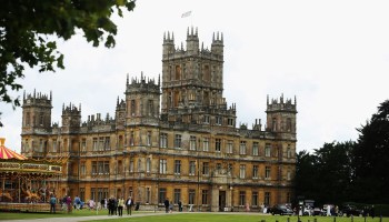 Visitors attend a 1920s themed event at Highclere Castle, the main set location of "Downton Abbey," in 2019.