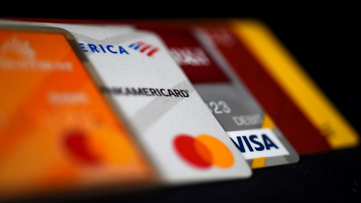 A collection of credit and debit cards are shown.