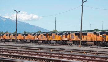 Idle Union Pacific engines sit in rows at a train yard in Salt Lake City in June 2020.