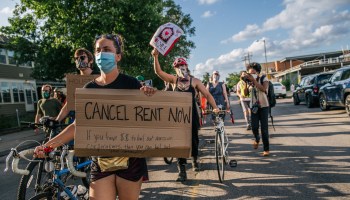 Demonstrators march in the street during the Cancel Rent and Mortgages rally on June 30, 2020 in Minneapolis, Minnesota. The rally was organized to demand the temporary cancellation of rents and mortgages as COVID-19 continues to adversely effect the economy.