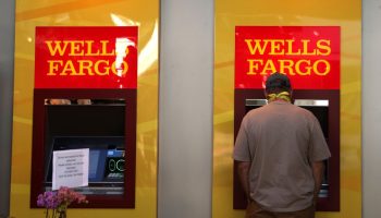A customer uses an ATM at a Wells Fargo branch in San Rafael, California.
