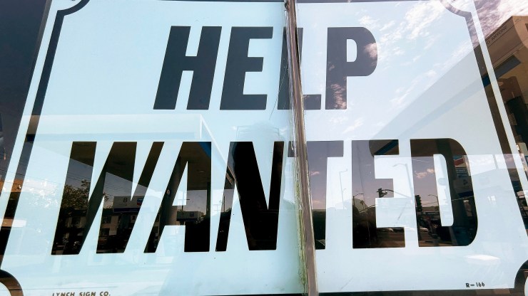 A "Help Wanted" at a gas station on June 23 in Los Angeles.