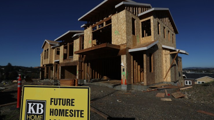 A sign is posted in front of a home under construction at a new housing development on November 17, 2016 in Petaluma, California.