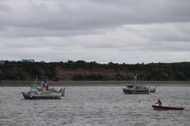 Setnetters and drift gillnetters fish nearby one another for sockeye salmon outside Naknek, Alaska. Naknek is one of seven communities in Bristol Bay where the economy is heavily dependent on the salmon industry.