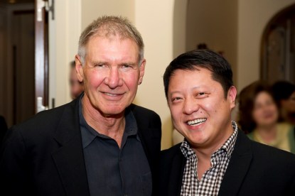 American producer David Lee (right) worked with Harrison Ford on Ender's Game, which his firm Leeding Media distributed in China. (Courtesy of David Lee)