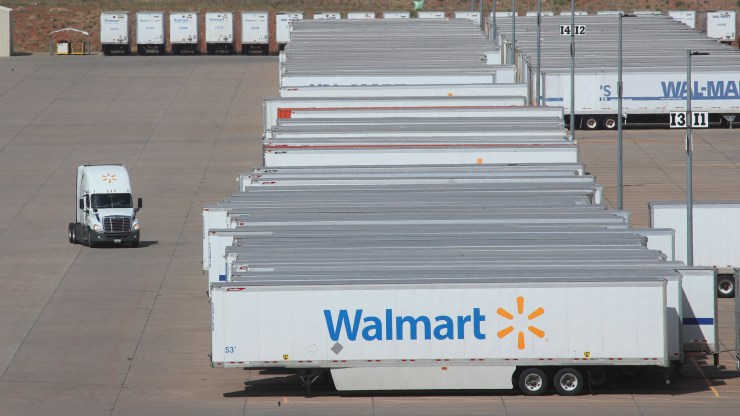 A truck drives to hook up a trailer a large Walmart regional distribution center on June 6, 2019 in Washington, Utah.