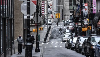 An empty street and closed businesses are seen on April 30, 2020 in the Financial District in New York City.