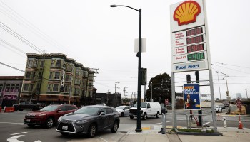 Gas prices nearing $6 a gallon are displayed at a Shell station on July 12 in San Francisco.