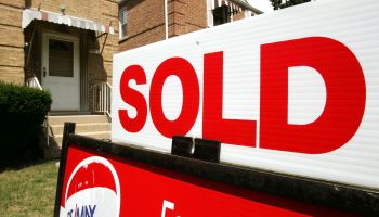 A "Sold" sign in front of a house. The key to understanding racial inequality and appraisals is not through individual appraisers’ decisions, says sociologist Junia Howell. It’s “how the system or the way that we appraise houses more generally is structured or arranged."