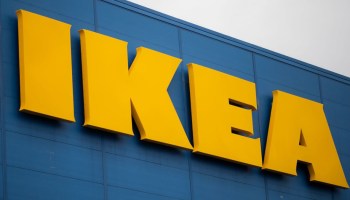 The Ikea logo on the side of a store.