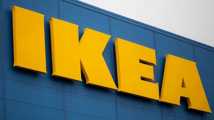 The Ikea logo on the side of a store.