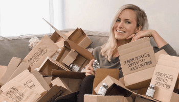 Lindsay McCormick, the founder and CEO of Bite, surrounded by packages of her company’s toothpaste tablets.