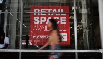 A closed retail store is shown along a Manhattan street July 24, 2019 in New York.