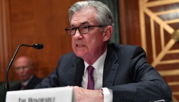 Federal Reserve Chairman Jerome Powell speaks in July. The central bank has been communicating about eventually tapering its bond purchases so the markets will be prepared when it starts.