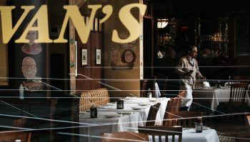 A waiter works in a nearly empty restaurant in New York. Among the businesses tracked by Homebase, which makes employee scheduling and timecard software, the number of employees working has declined over the past two months.