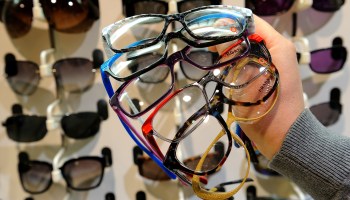 Glasses on display at an eyewear shop.