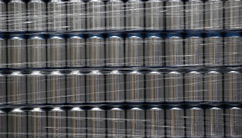 Stacks of empty aluminum cans sit on a pallet before being filled with beer at Devil's Canyon Brewery on June 6, 2018 in San Carlos, California.