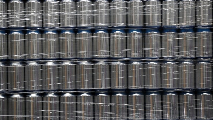 Stacks of empty aluminum cans sit on a pallet before being filled with beer at Devil's Canyon Brewery on June 6, 2018 in San Carlos, California.