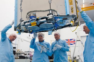Technicians at work at Surrey Satellite Technology in Guildford, England. (Photo courtesy of Surrey Satellite)