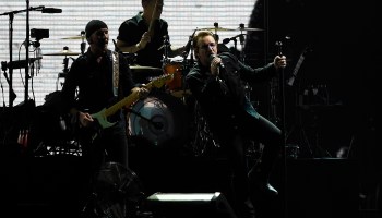 U2 performing in concert in 2019.