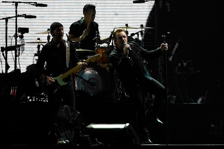 U2 performing in concert in 2019.