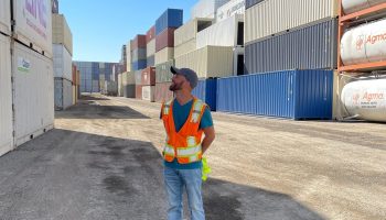 Sales manager Carlos Carrillo at ConGlobal Industries' container storage depot. After unloading, he said, "they terminate here before they go out back to China or wherever it may be.”