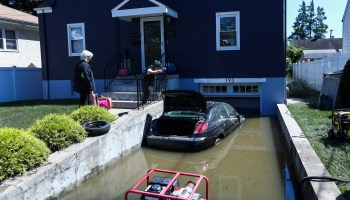 A car sits on a flooded garage of a house following a night of heavy wind and rain from the remnants of Hurricane Ida on September 02, 2021 in Mamaroneck, New York.