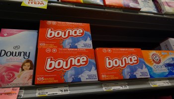 Boxes of Bounce dryer sheets, owned by Procter & Gamble, on a store shelf.