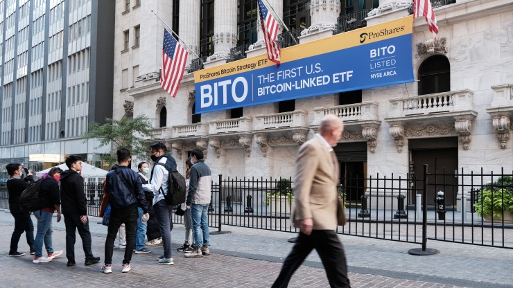 A banner ballyhooes the newly listed bitcoin ETF outside the New York Stock Exchange on Tuesday.
