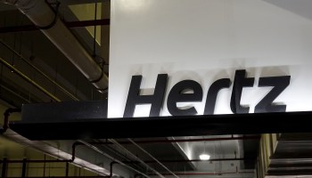 A Hertz car rental sign in the Miami International Airport on Oct. 25, 2021 in Miami.