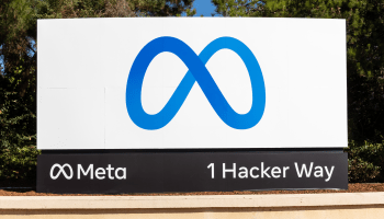 There is a new Facebook headquarter sign for its debut brand name: "Meta." It includes a white billboard with a light blue infinity "M" logo on the front.