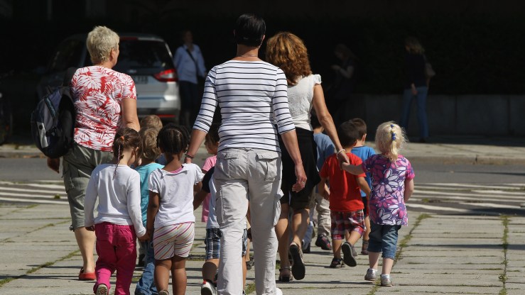 Day care workers accompany a group of children on August 22, 2012 in Berlin, Germany.