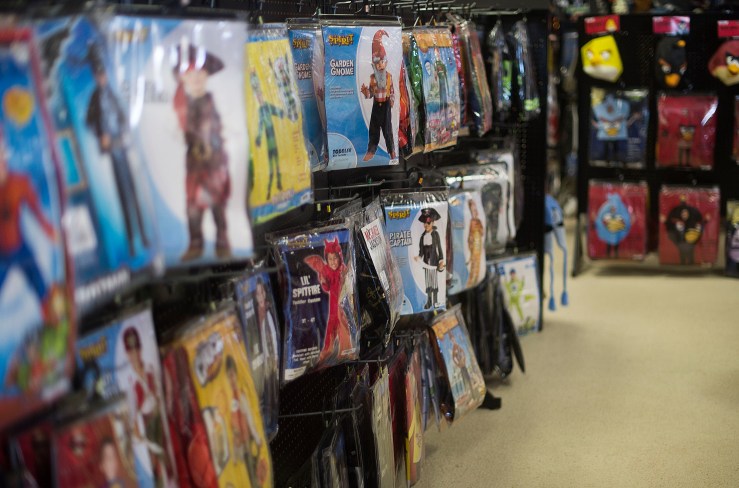 Children's Halloween costumes hang on a wall at a Spirit Halloween costume store in Easton, Maryland.