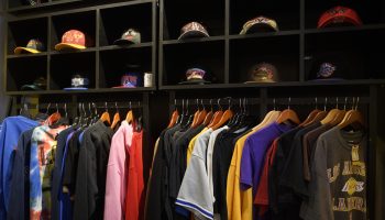 Shirts and hats are shown in a small retailer in Los Angeles before the 2020 holiday shopping season.
