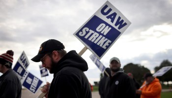 Striking workers picket outside a John Deere facility in Iowa in October. Some have seen the strike as an example of workers' increased negotiating power.