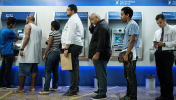 Customers line up at a state-owned bank in Brazil in 2017. According to logistics expert Keely Croxton, the mathematical formulas that explain wait times at an ATM can be applied to global supply chains.