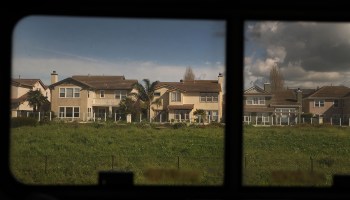 A suburban neighborhood is seen from an Amtrak window as the California Zephyr comes close to the end of its daily 2,438-mile trip to Emeryville.