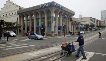 Pedestrians walk by a Chase bank on July 13, 2021 in San Francisco, California.