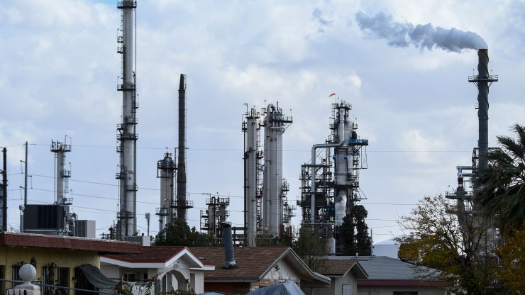 The Marathon Petroleum Corp. El Paso oil refinery operates near a neighborhood of homes in East-Central El Paso on December 10, 2021 in El Paso, Texas.