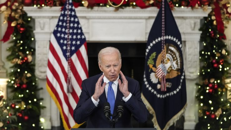 U.S. President Joe Biden speaks about the omicron variant of the coronavirus in the State Dining Room of the White House, Dec. 21.