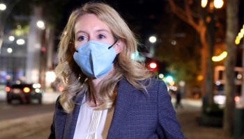 Theranos founder and former CEO Elizabeth Holmes wearing a face mask.
