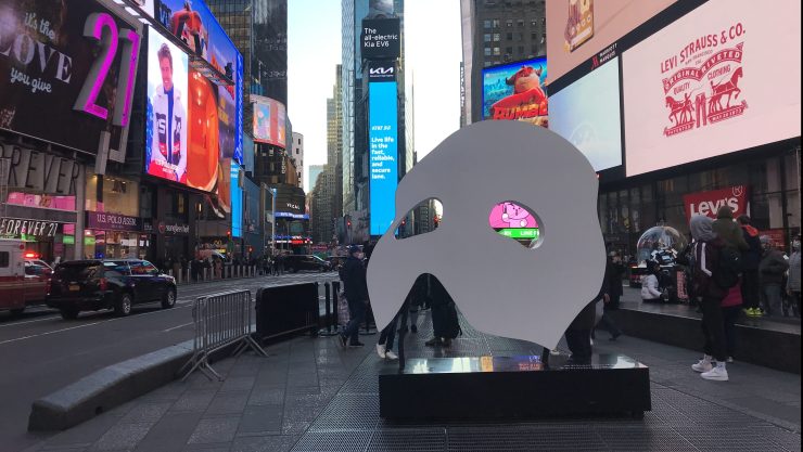 An oversized Phantom of the Opera mask in Times Square on December 20, 2021.