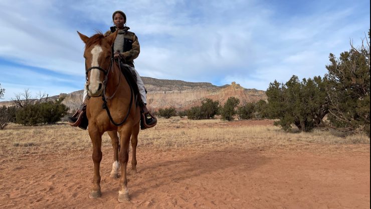 Atiya Jones rides a horse in New Mexico during her grant-funded "gap year."
