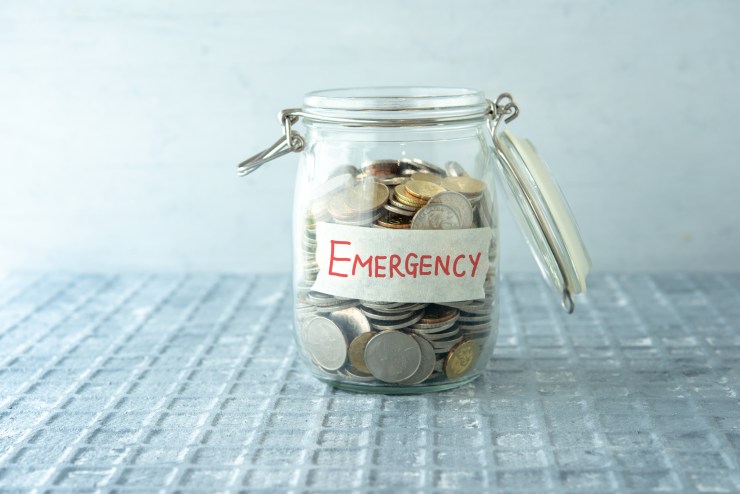 A jar full of coins reads "Emergency."