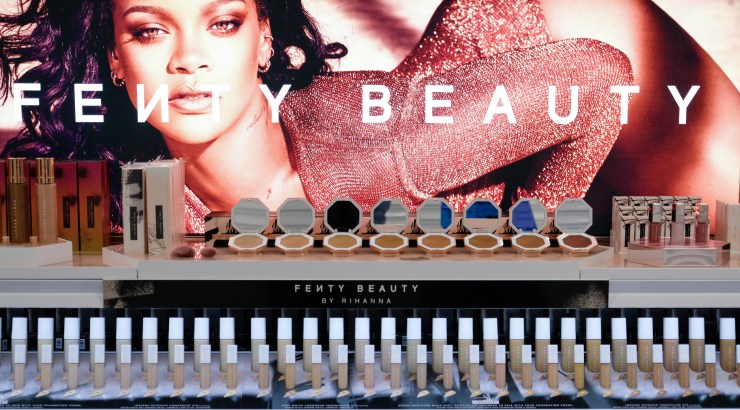 An advertisement for Fenty Beauty products.