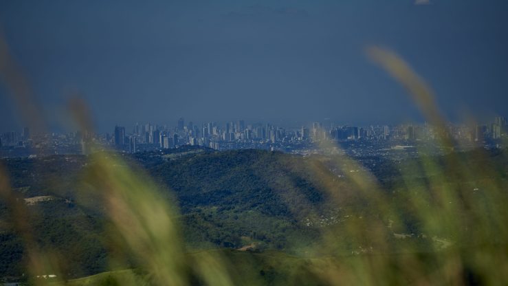 Image of the city scape of Baras, Philippines with nature in the foreground
